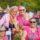 Group of women in pink at Music in the Park, Leyland